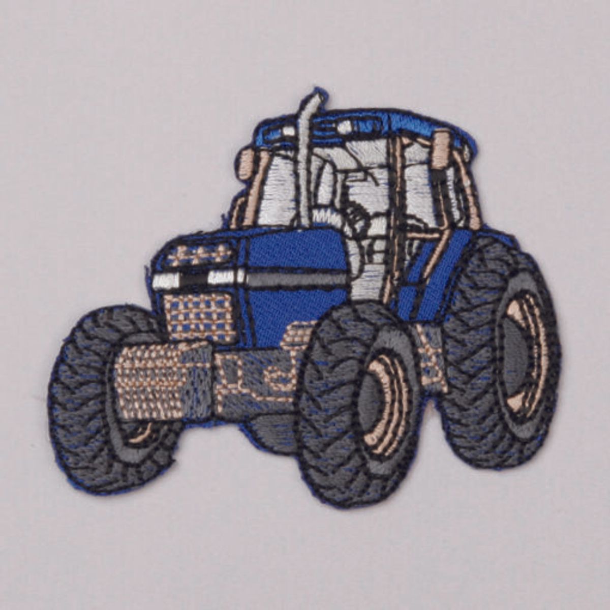 Blå traktor strykemerke 6x6,5cm